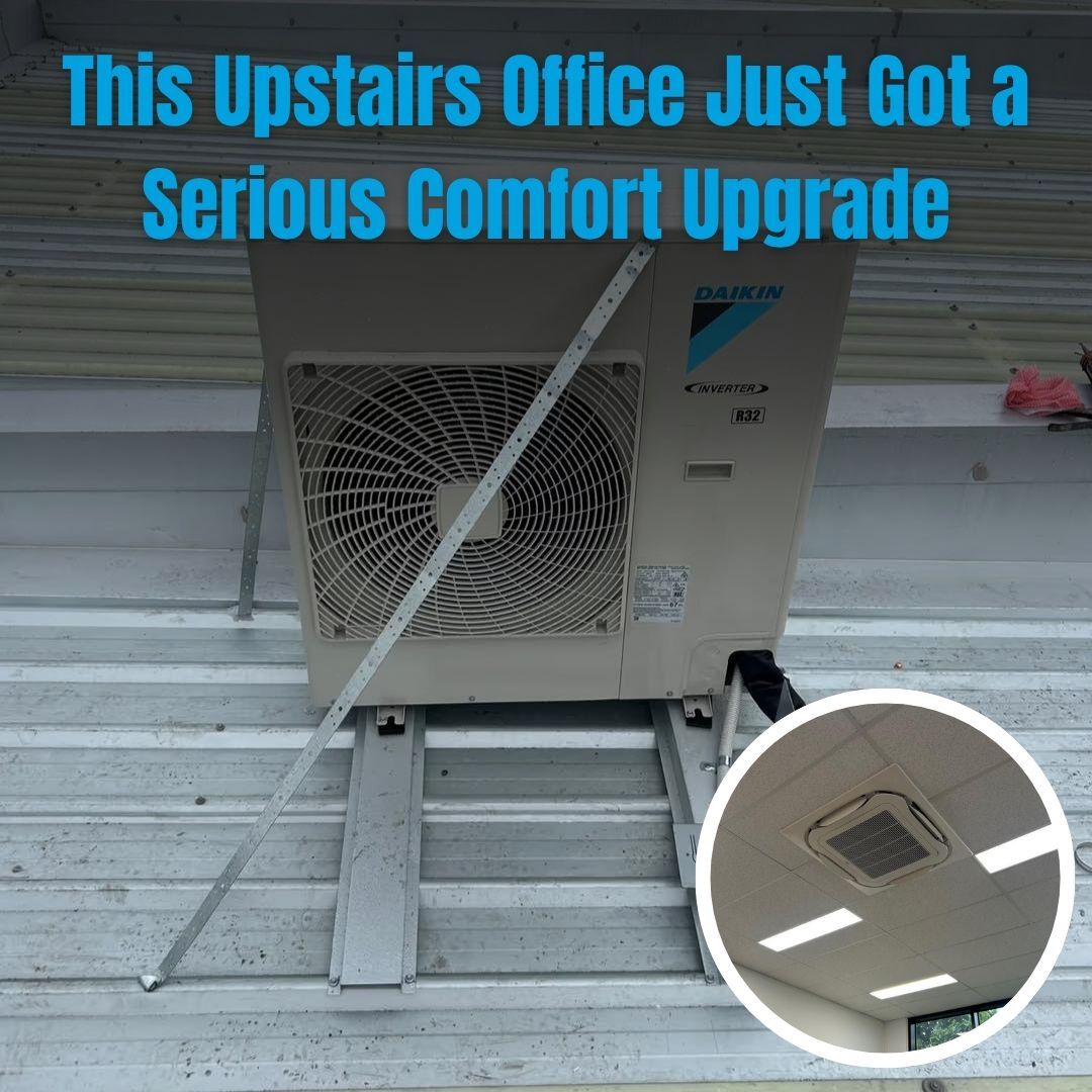 This is an image of GT HVAC & Electrical installing a new air conditioner in an upstairs office in Melbourne